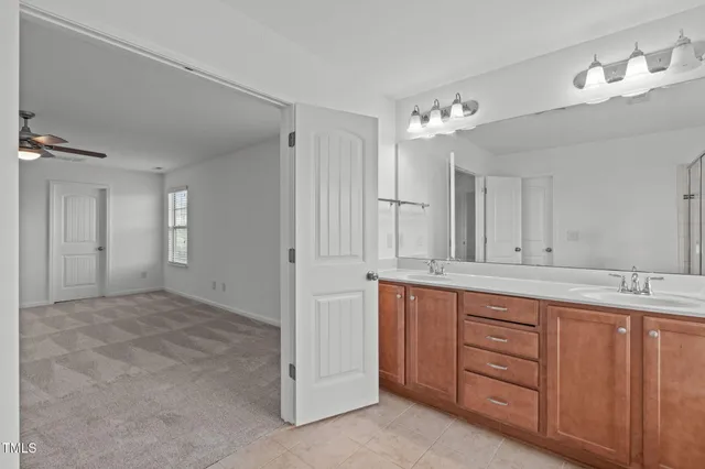 a view of a kitchen with dishwasher and cabinets