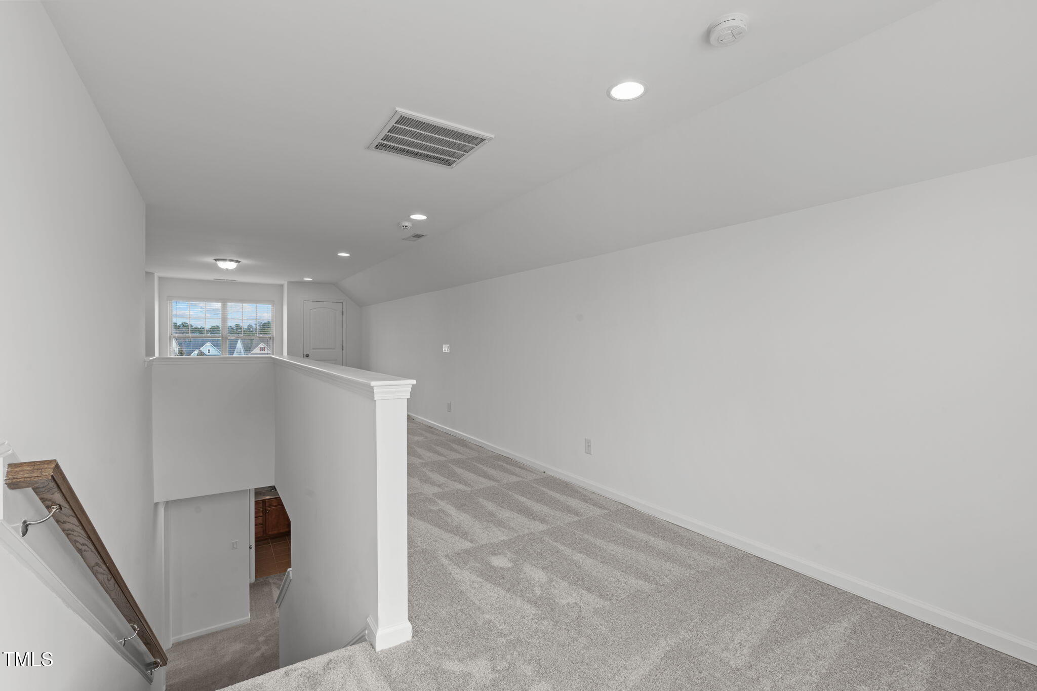 4139 Davis Meadow Street Raleigh, NC 27616 - Photo 35 of 43 an empty room with wooden floor and a ceiling fan