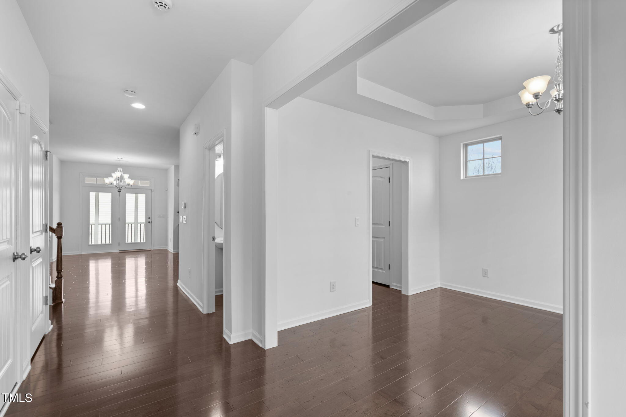 4139 Davis Meadow Street Raleigh, NC 27616 - Photo 5 of 43 a view of empty room with wooden floor