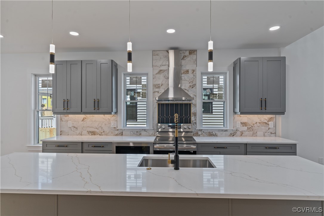 2805 Bethlehem Road Henrico, VA 23228 - Photo 14 of 42 Kitchen featuring a wood stove, gray cabinets, wal