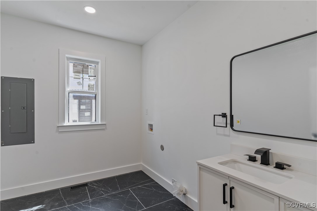 2805 Bethlehem Road Henrico, VA 23228 - Photo 23 of 42 Washroom with electric panel, sink, hookup for a w