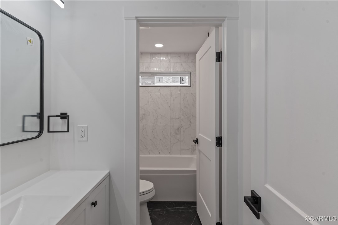 2805 Bethlehem Road Henrico, VA 23228 - Photo 24 of 42 Full bathroom featuring toilet, vanity, and tiled