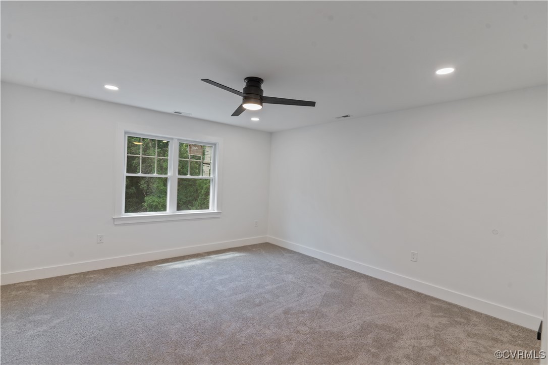 2805 Bethlehem Road Henrico, VA 23228 - Photo 30 of 42 Empty room with ceiling fan and light carpet