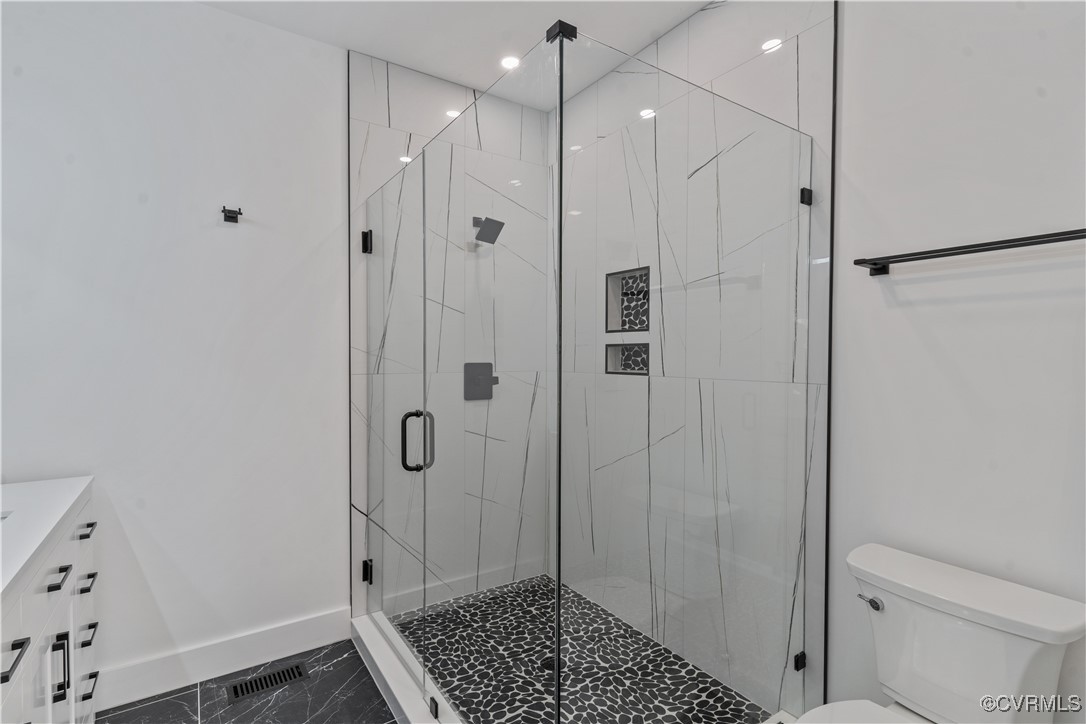 2805 Bethlehem Road Henrico, VA 23228 - Photo 34 of 42 Bathroom with toilet, vanity, and a shower with do