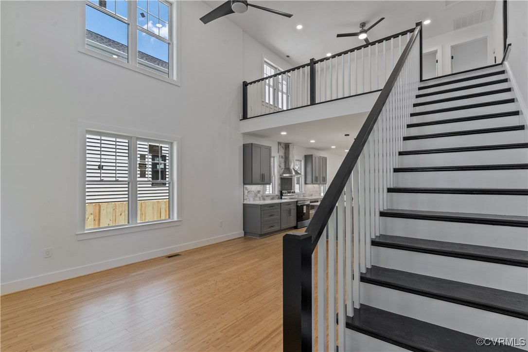 2805 Bethlehem Road Henrico, VA 23228 - Photo 7 of 42 Stairway with ceiling fan, a towering ceiling, and