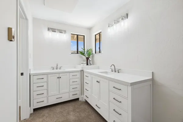 a bathroom with a tub and shower