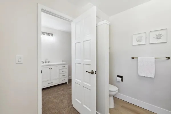 a white bath tub sitting next to a window