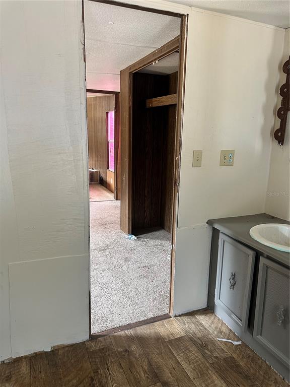 12232 Southwest 44th Drive Webster, FL 33597 - Photo 11 of 28 a view of livingroom with hallway