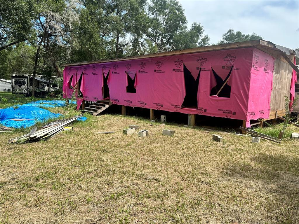 12232 Southwest 44th Drive Webster, FL 33597 - Photo 22 of 28 a view of outdoor space and yard