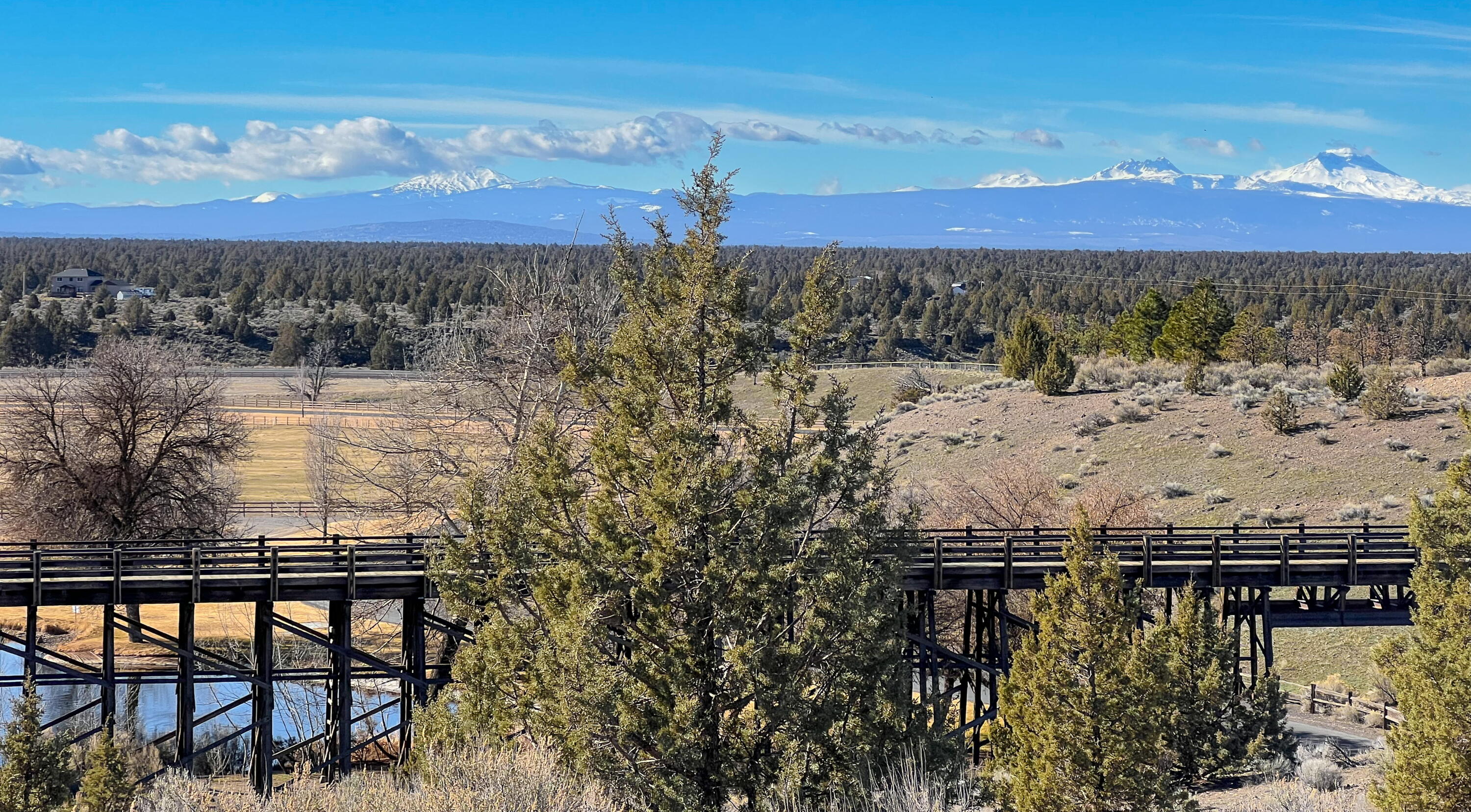 15944 South W Brasada Ranch Road, Unit LOT 285 Powell Butte, OR 97753 - Photo 22 of 30 a view of a lake from a yard