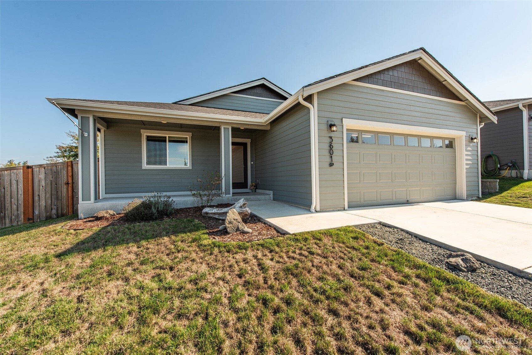 3601 Page Street Port Angeles, WA 98362 - Photo 1 of 35 a front view of a house with a yard