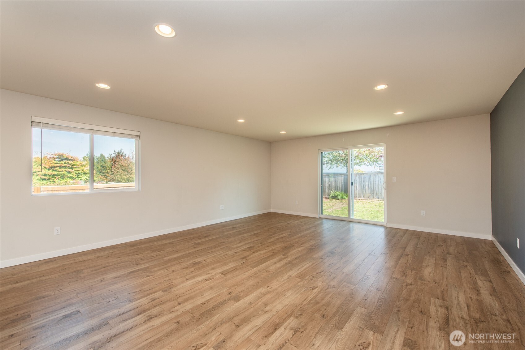 3601 Page Street Port Angeles, WA 98362 - Photo 17 of 40 an empty room with wooden floor and windows