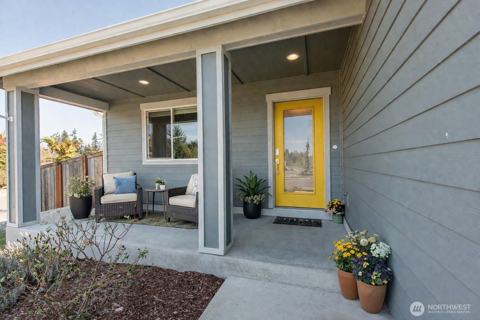 3601 Page Street Port Angeles, WA 98362 - Photo 2 of 40 a front view of a house with outdoor seating