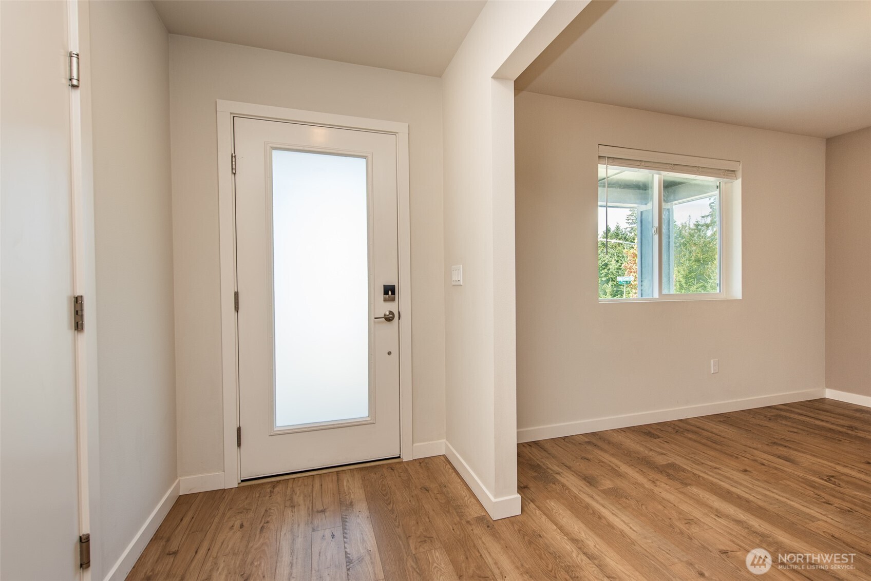 3601 Page Street Port Angeles, WA 98362 - Photo 8 of 40 an empty room with wooden floor and windows
