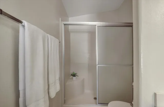 a bathroom with a sink a vanity and a mirror