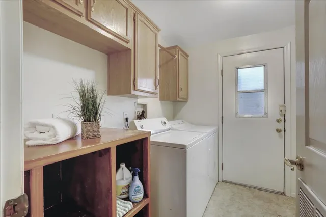 a bathroom with a bathtub shower sink vanity and a mirror