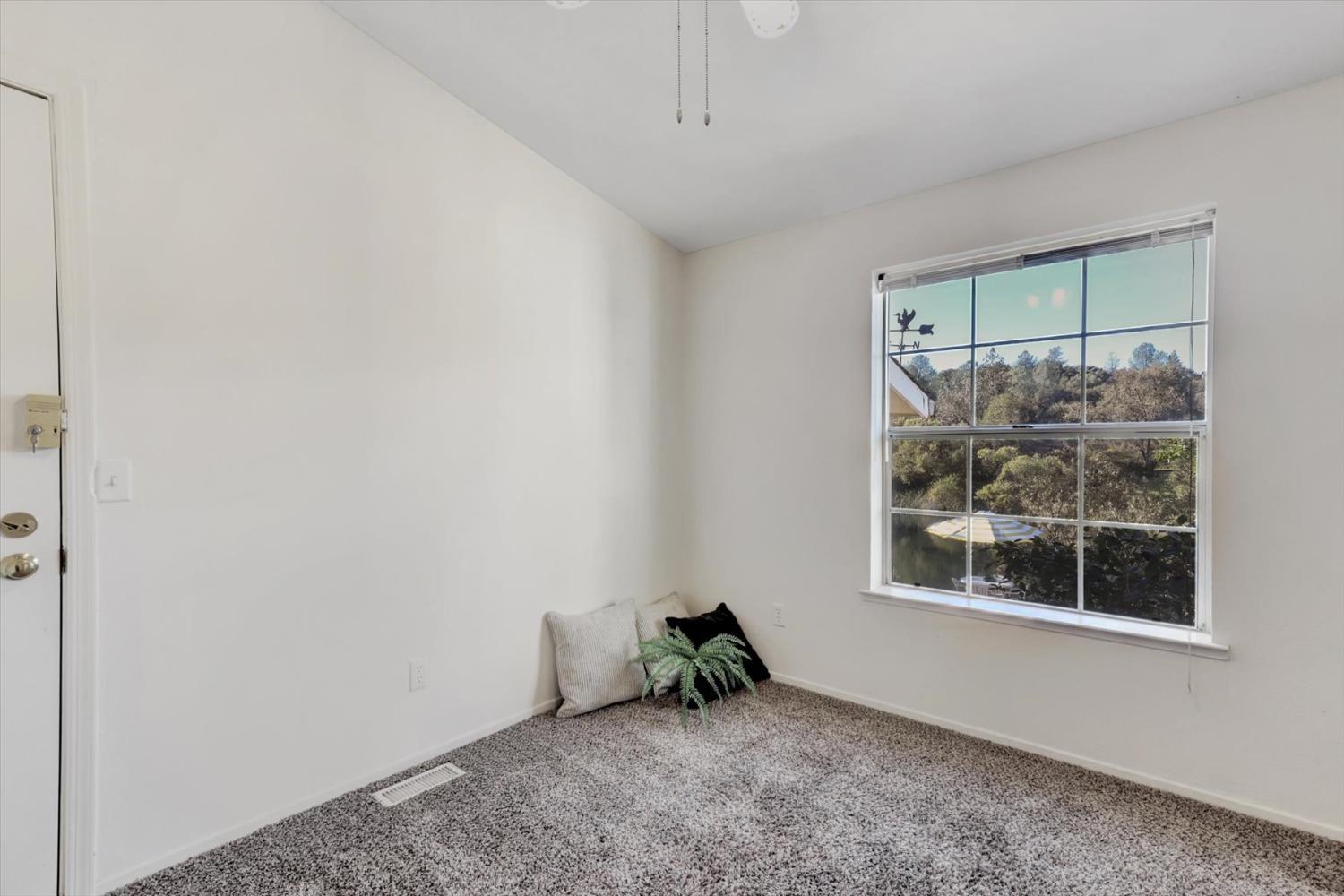 16260 Hillaire Road Rough and Ready, CA 95975 - Photo 17 of 45 a view of empty room with window