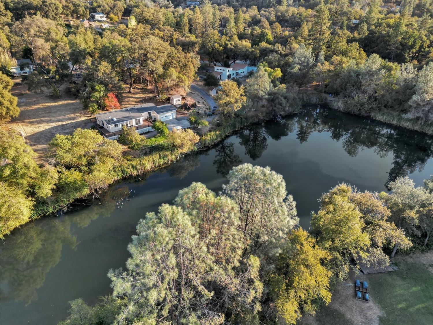 16260 Hillaire Road Rough and Ready, CA 95975 - Photo 25 of 45 an aerial view of a house with a lake view