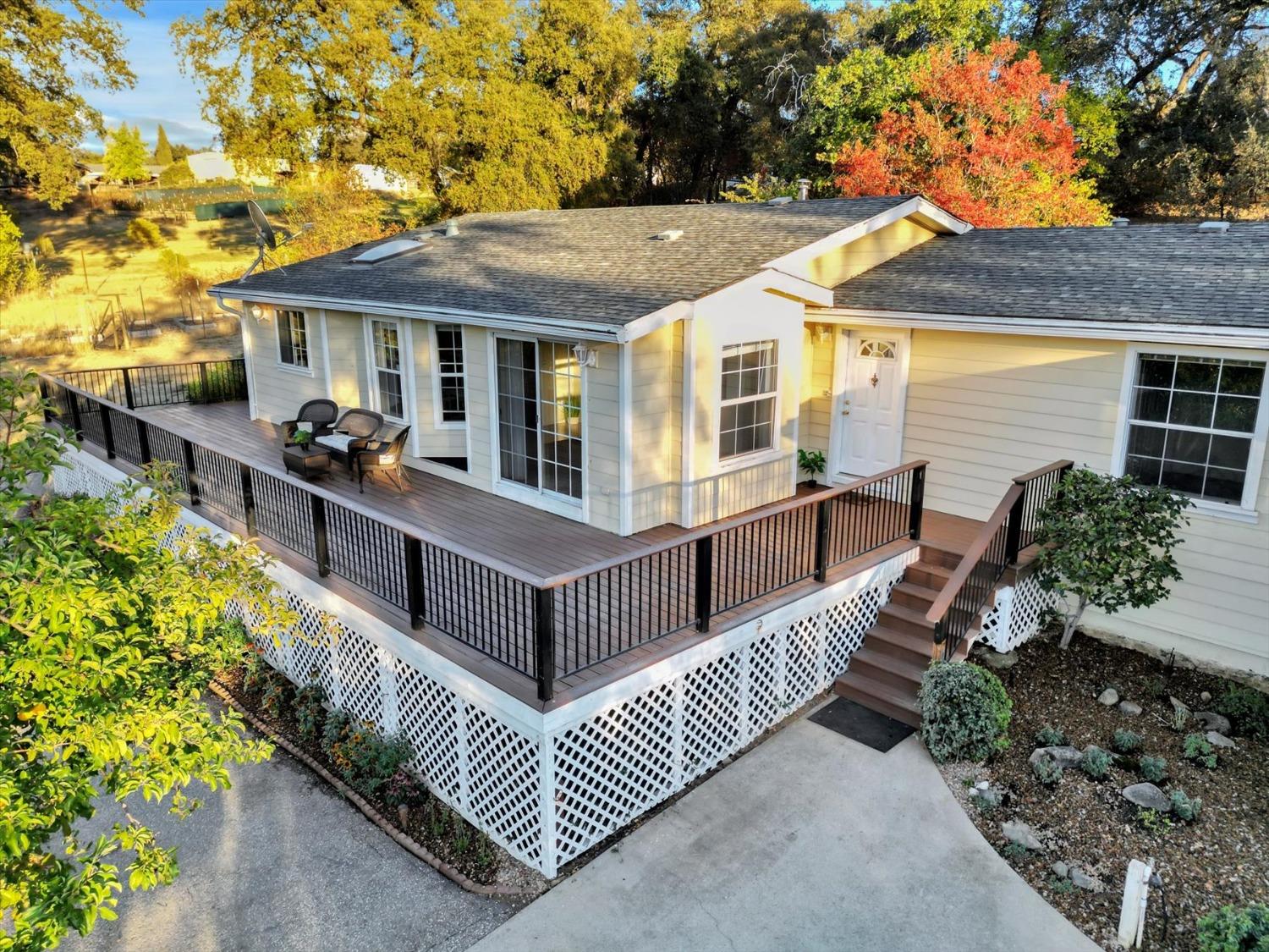 16260 Hillaire Road Rough and Ready, CA 95975 - Photo 29 of 45 a view of house with a chairs in patio