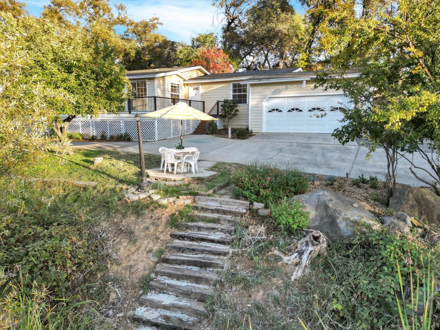 16260 Hillaire Road Rough and Ready, CA 95975 - Photo 31 of 45 a view of a house with a yard