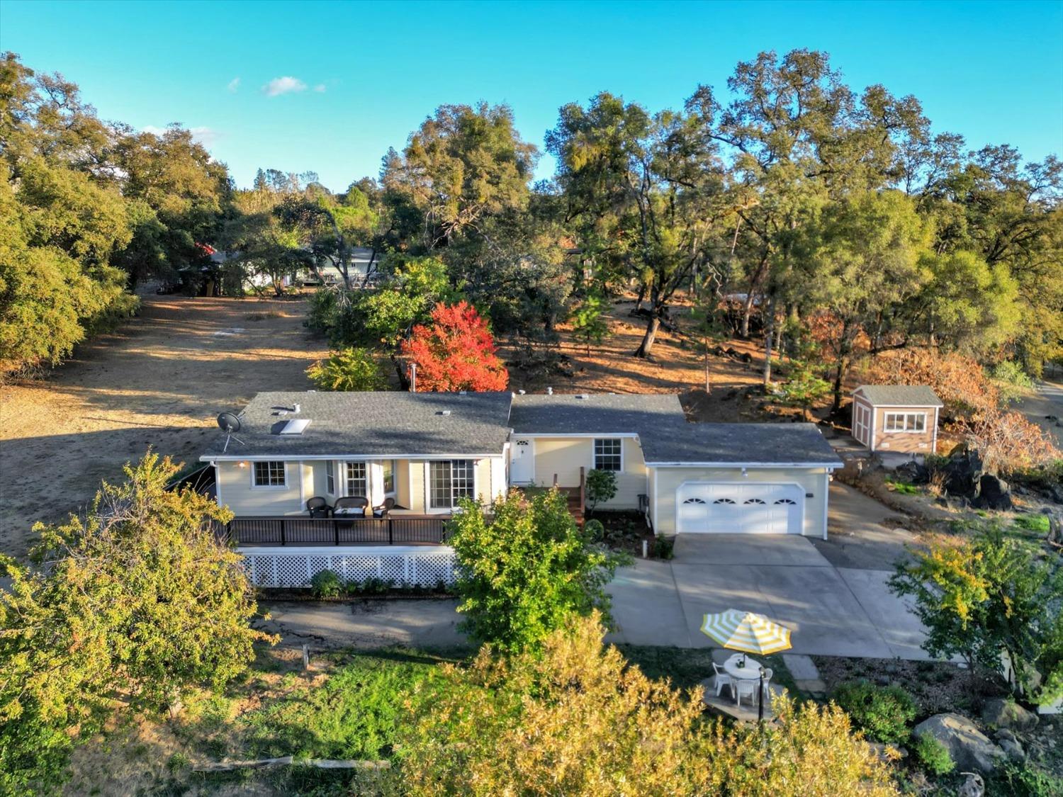 16260 Hillaire Road Rough and Ready, CA 95975 - Photo 32 of 45 an aerial view of a house with garden space and street view