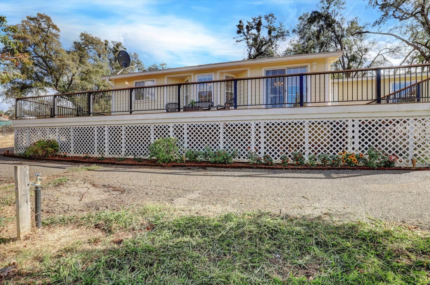 16260 Hillaire Road Rough and Ready, CA 95975 - Photo 34 of 45 a front view of a house with a yard