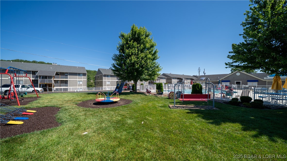 611 Lazy Days Road, Unit I6 Osage Beach, MO 65065 - Photo 35 of 44 Playground by Pool 1
