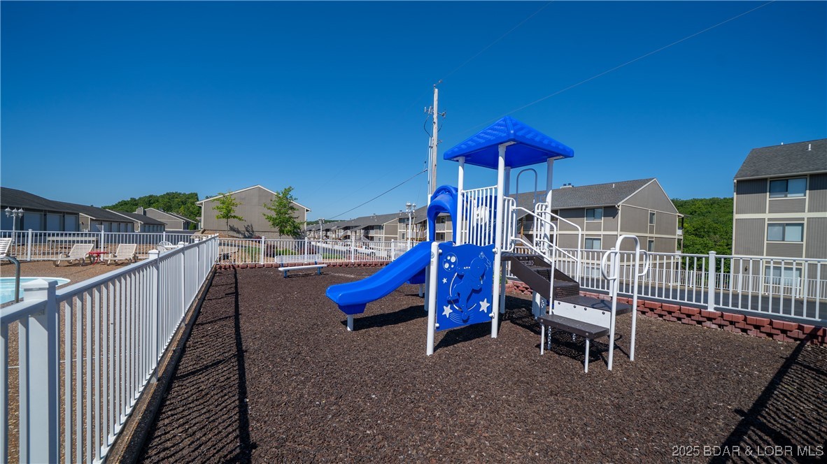 611 Lazy Days Road, Unit I6 Osage Beach, MO 65065 - Photo 40 of 44 Playground by Pool 2