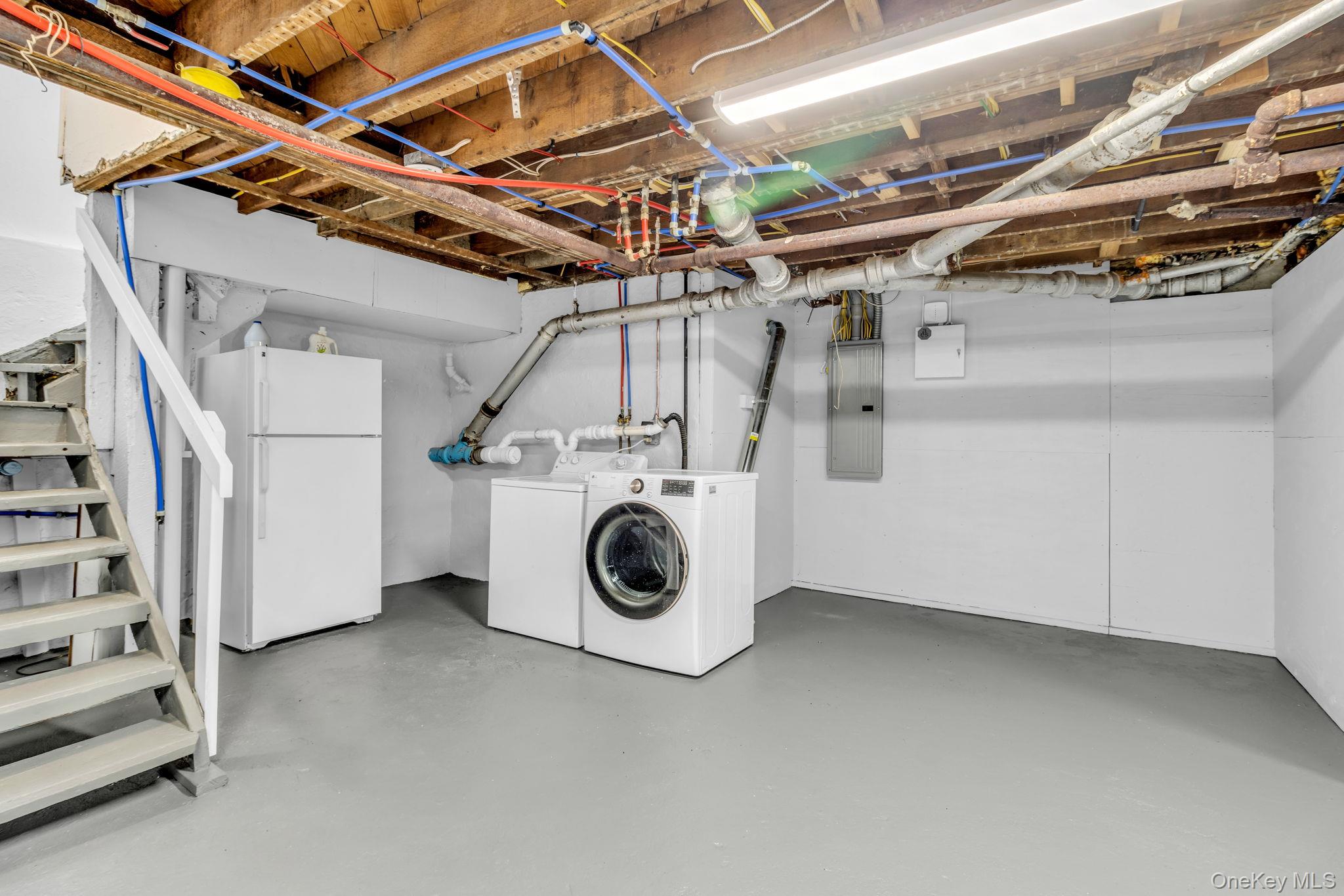 475 Dobbs Ferry Road White Plains, NY 10607 - Photo 18 of 29 a utility room with dryer and washer