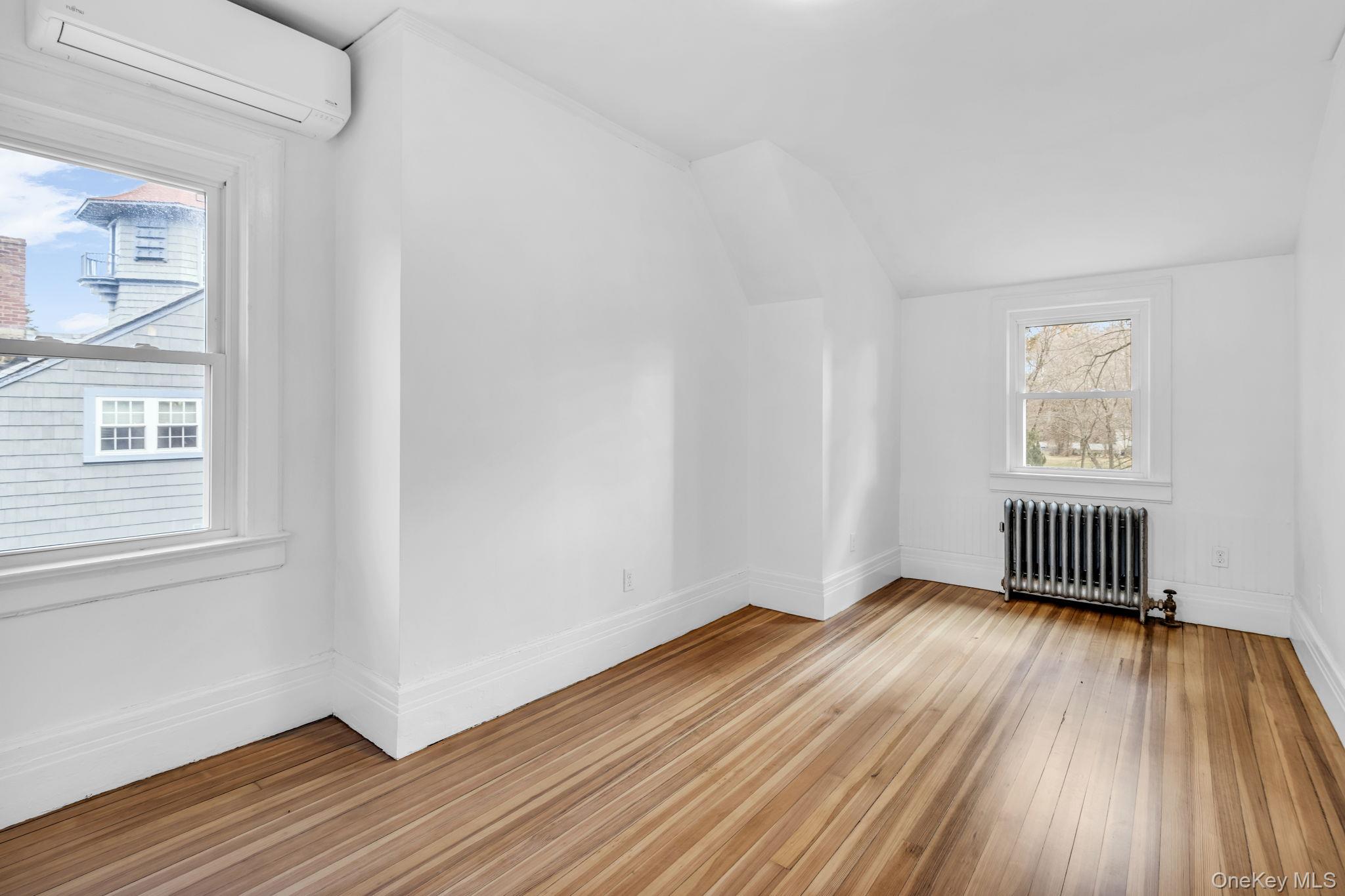 475 Dobbs Ferry Road White Plains, NY 10607 - Photo 26 of 29 a view of an empty room and wooden floor