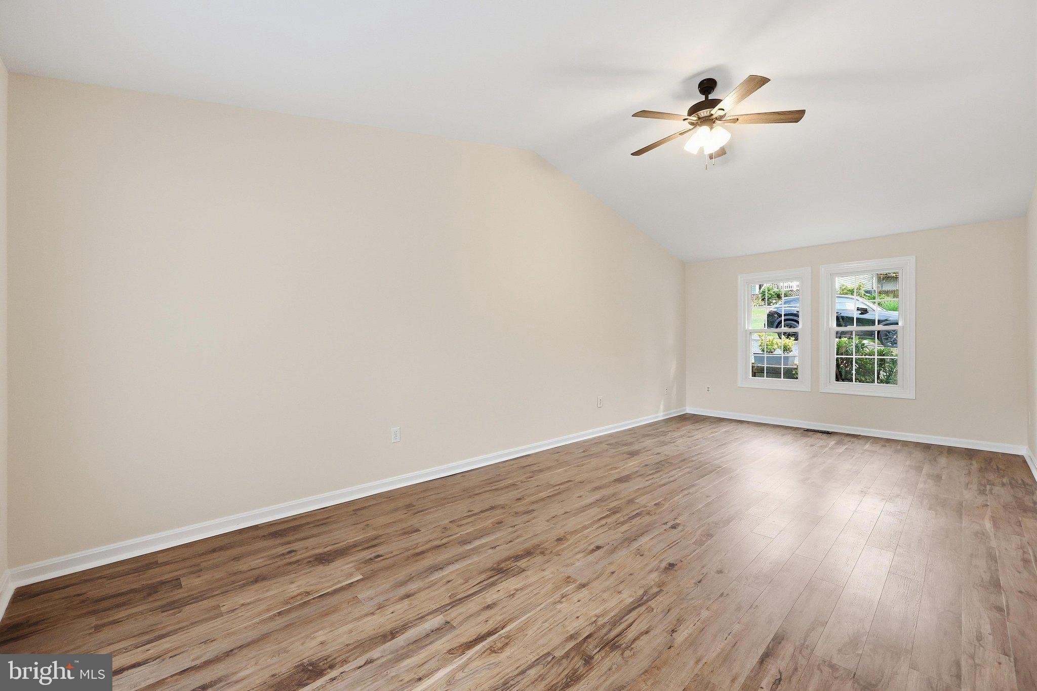 6710 Hemlock Point Road New Market, MD 21774 - Photo 4 of 66 Main level family room with wood floors.