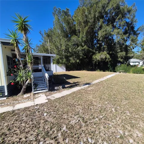 a view of swimming pool from a lake view