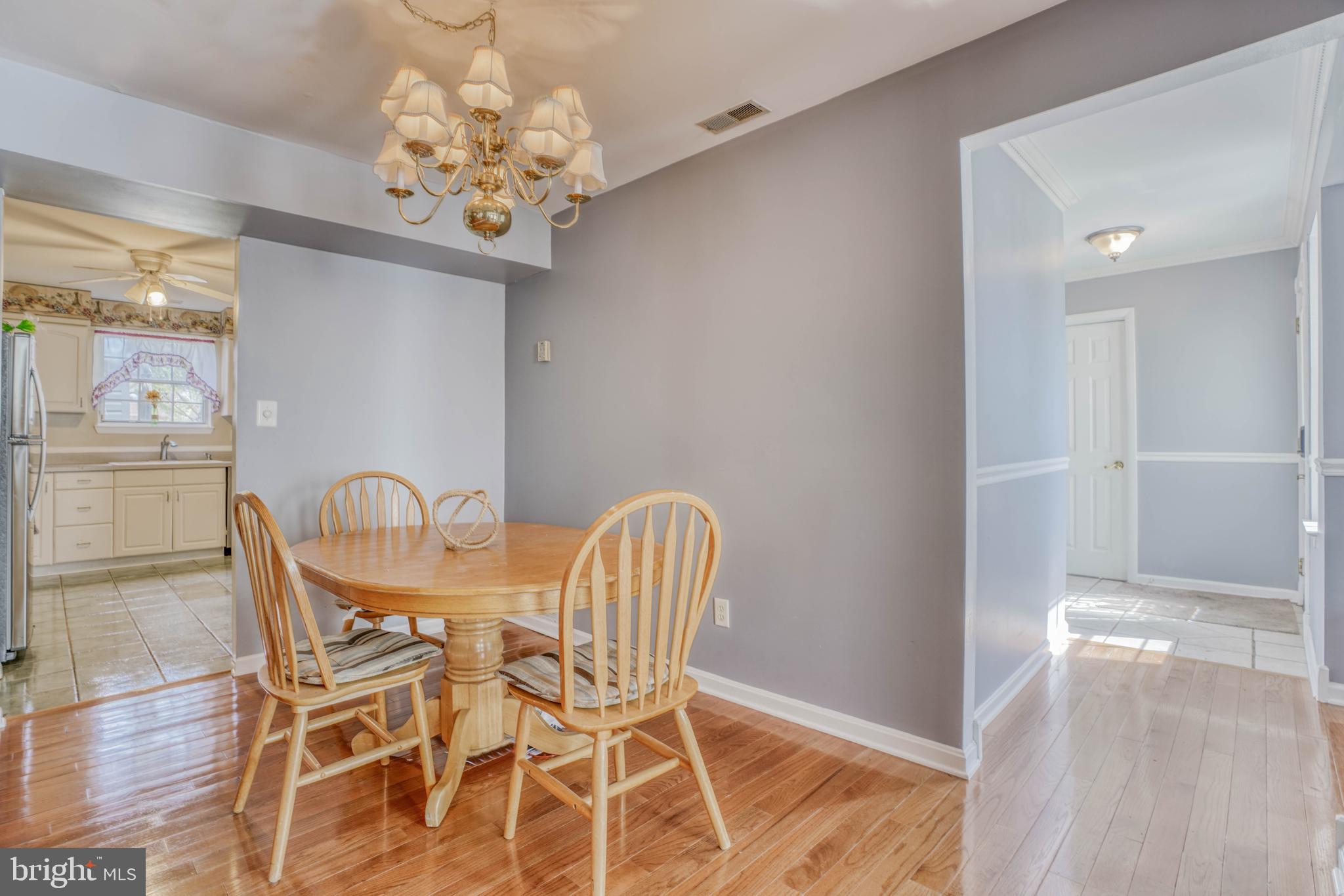 8605 Heathermill Road Baltimore, MD 21236 - Photo 14 of 50 DR - W/ entrance to the kitchen and hardwood floor