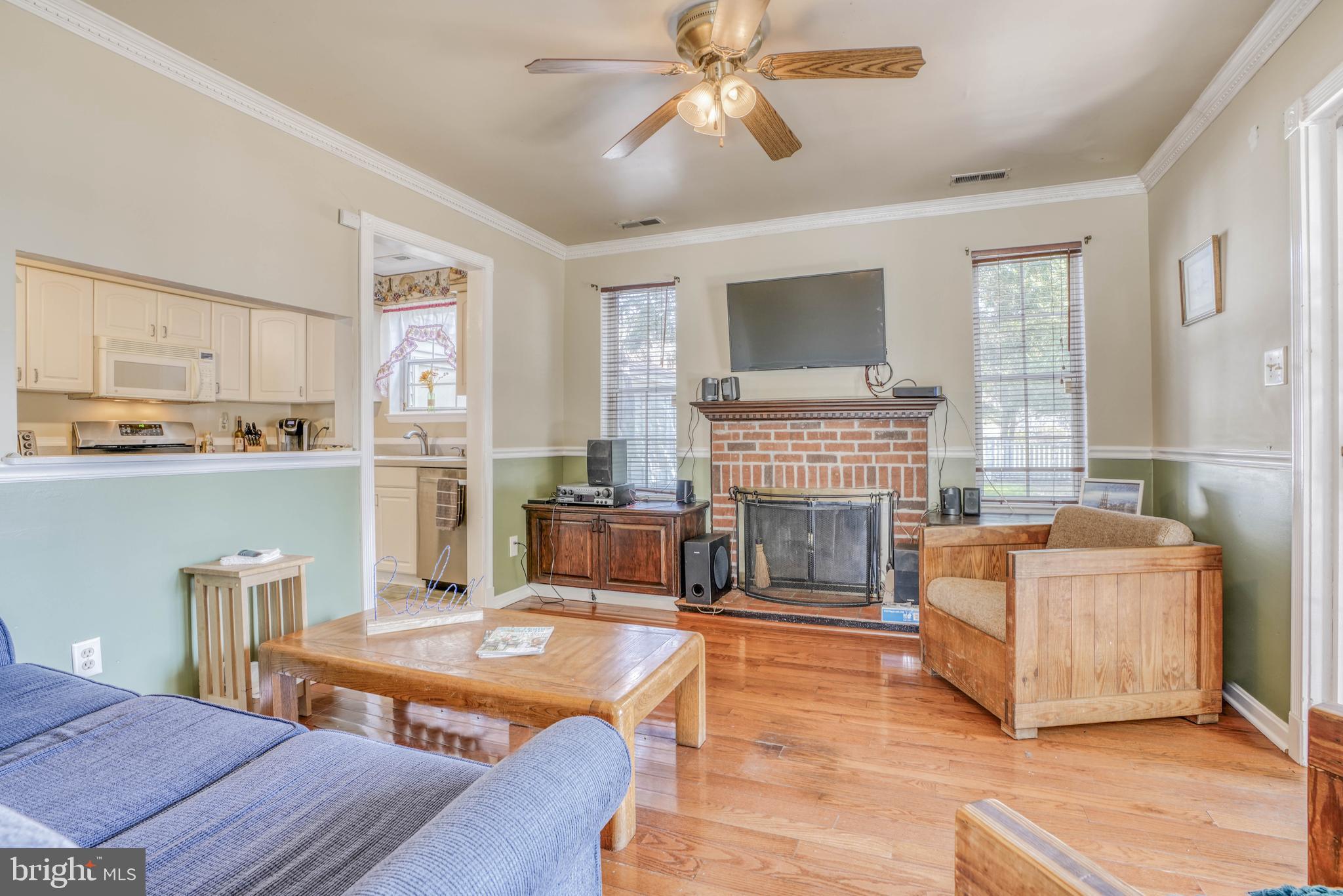 8605 Heathermill Road Baltimore, MD 21236 - Photo 18 of 50 Family room - W/ charming brick details
