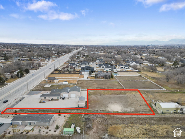 Expansive undeveloped land parcel with direct road frontage