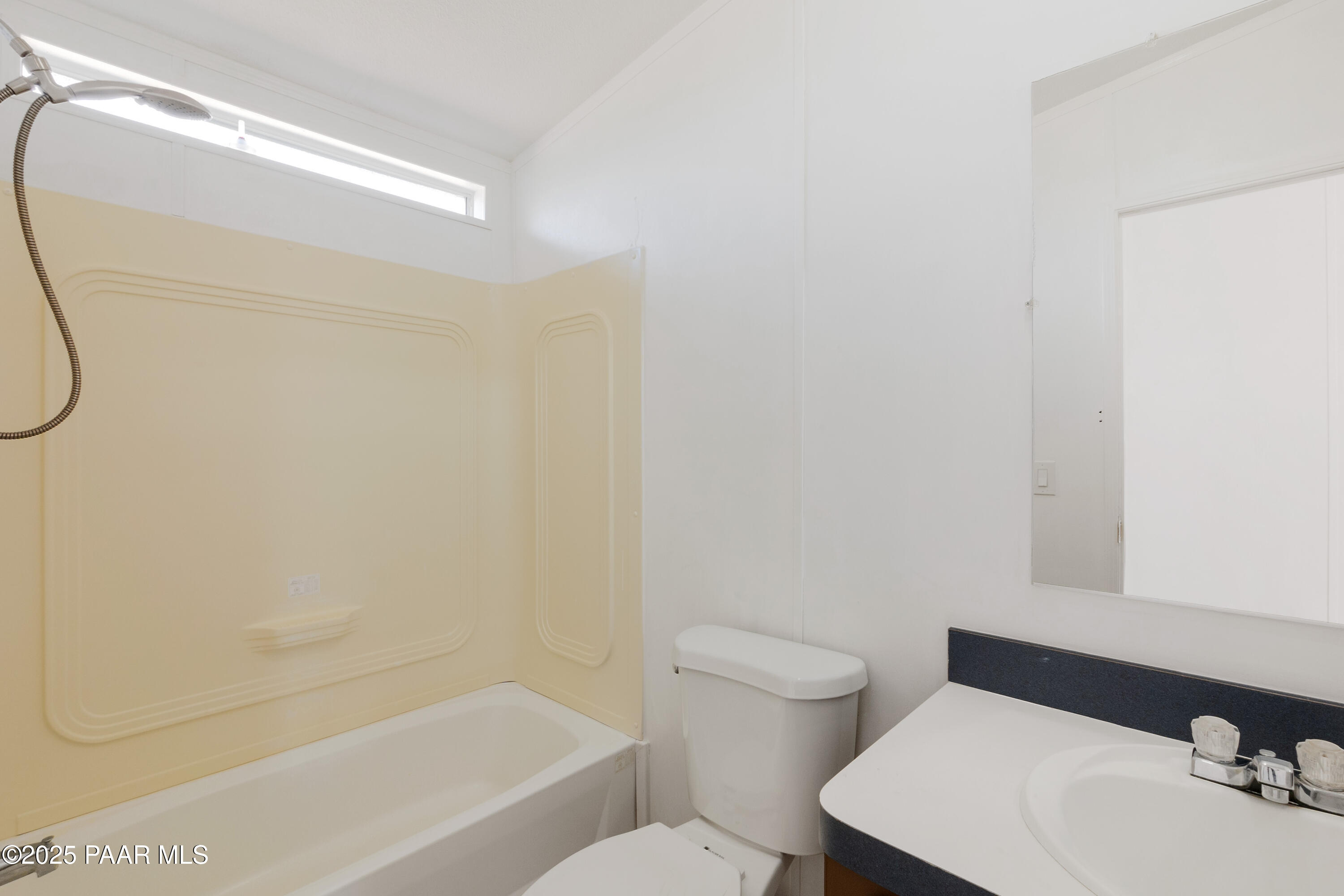 17841 East Willow Creek Road Kingman, AZ 86401 - Photo 12 of 73 a bathroom with a sink and a toilet