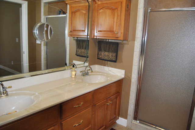 377 Wheeler Road Gray, GA 31032 - Photo 11 of 45 a bathroom with a sink and a mirror