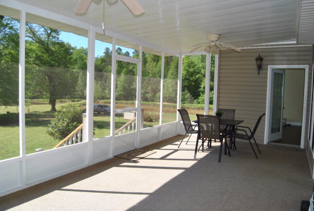 377 Wheeler Road Gray, GA 31032 - Photo 14 of 45 a view of a dining room with furniture window and outside view
