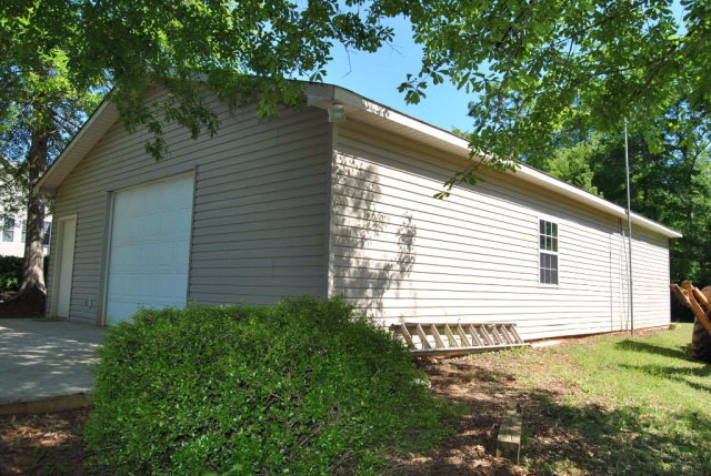 377 Wheeler Road Gray, GA 31032 - Photo 16 of 45 a house view with a backyard space