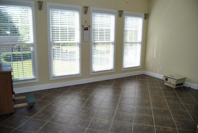 377 Wheeler Road Gray, GA 31032 - Photo 19 of 45 a view of an empty room with a window