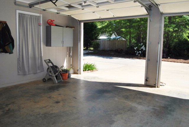 377 Wheeler Road Gray, GA 31032 - Photo 26 of 45 a view of livingroom with furniture and floor to ceiling window
