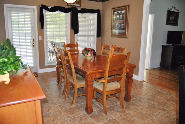 377 Wheeler Road Gray, GA 31032 - Photo 4 of 45 a dining room with furniture and window