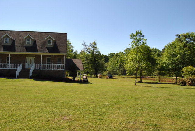 377 Wheeler Road Gray, GA 31032 - Photo 31 of 45 a view of swimming pool with an outdoor space and seating area