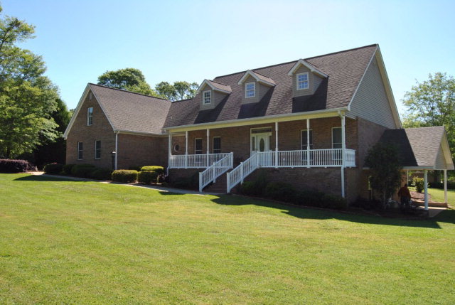 377 Wheeler Road Gray, GA 31032 - Photo 32 of 45 a view of a house with backyard porch and sitting area