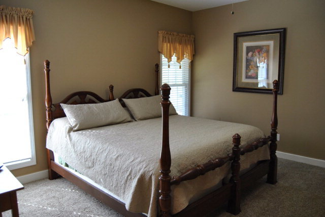 377 Wheeler Road Gray, GA 31032 - Photo 7 of 45 a bedroom with a bed and window