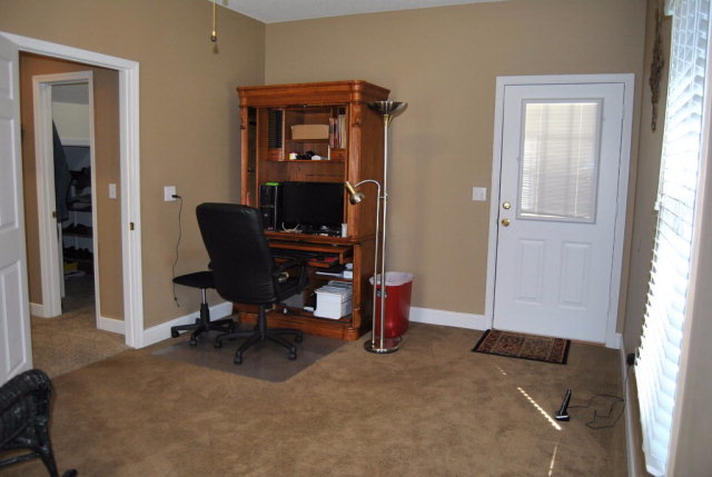 377 Wheeler Road Gray, GA 31032 - Photo 8 of 45 a view of a workspace with furniture and a window