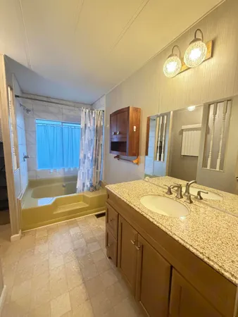 a bathroom with a sink and a toilet