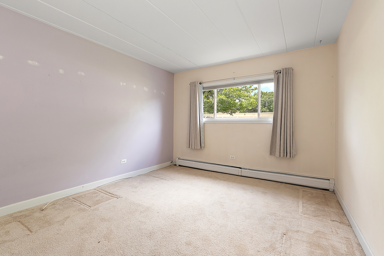 1000 South Lorraine Road, Unit 110 Wheaton, IL 60189 - Photo 17 of 29 an empty room with windows