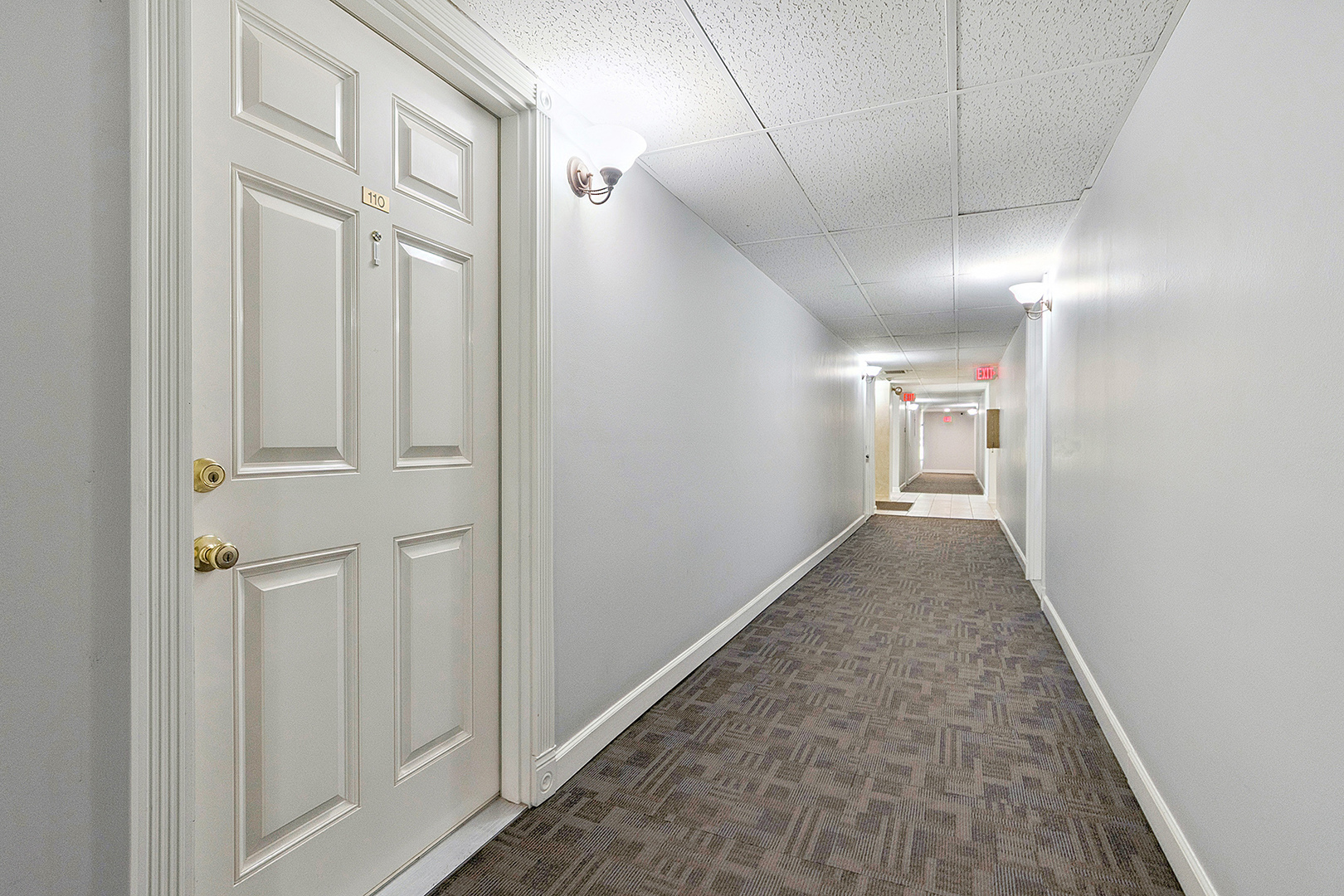 1000 South Lorraine Road, Unit 110 Wheaton, IL 60189 - Photo 7 of 29 a view of a hallway