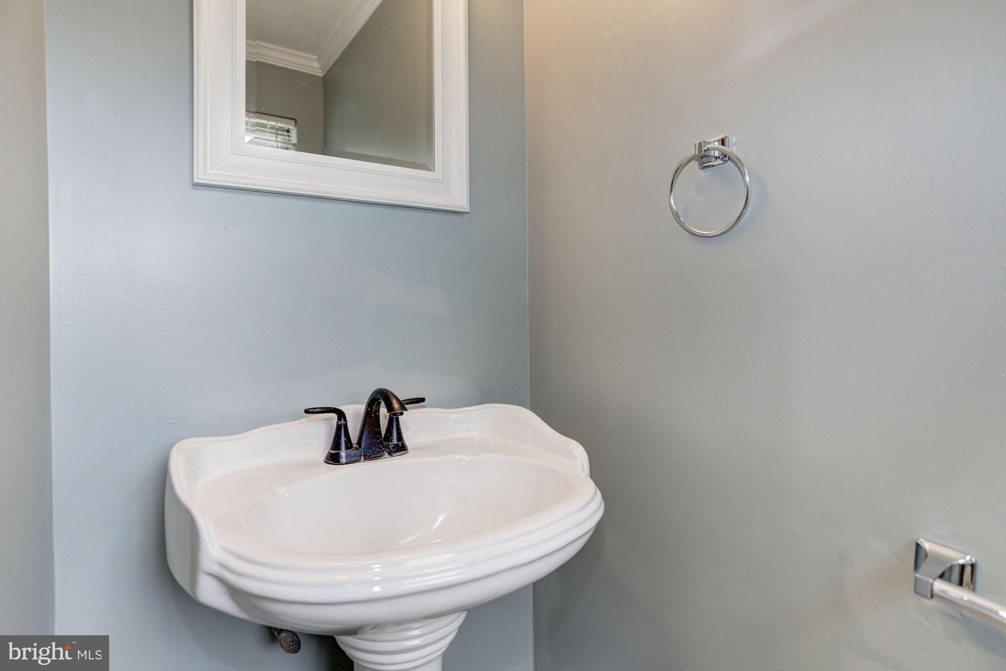 8453 Snowden Oaks Place Laurel, MD 20708 - Photo 14 of 37 Main Level Powder Room